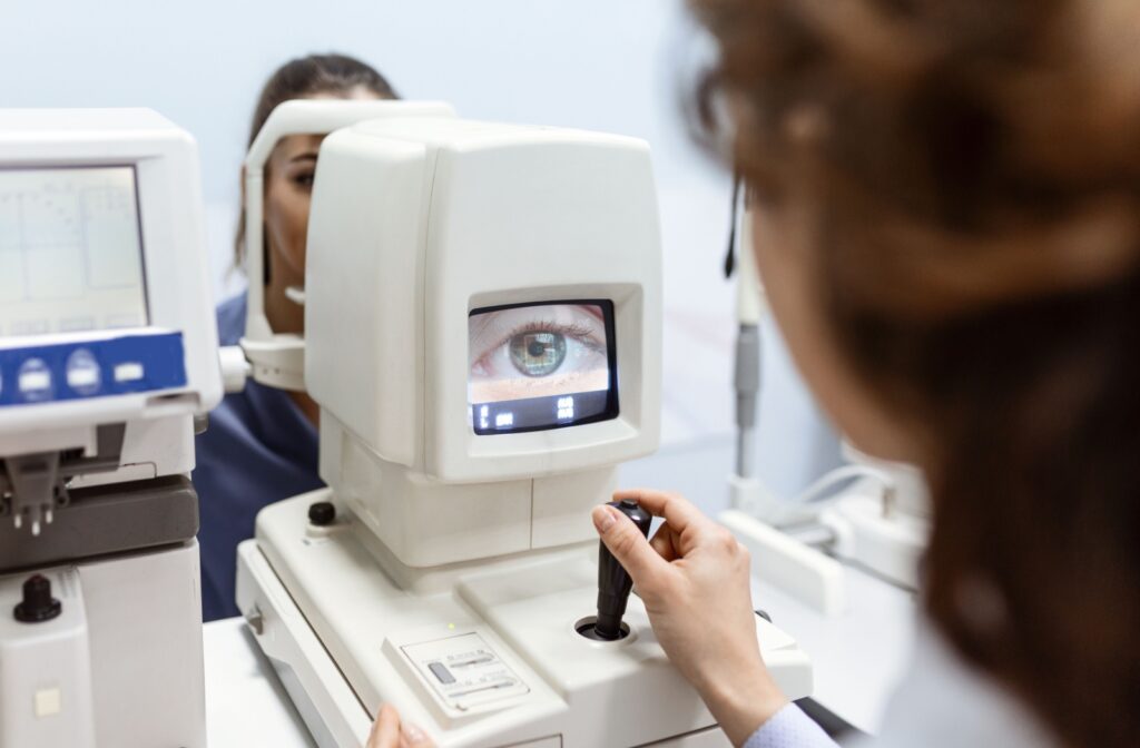 A patient undergoing preliminary testing for their routine eye exam.