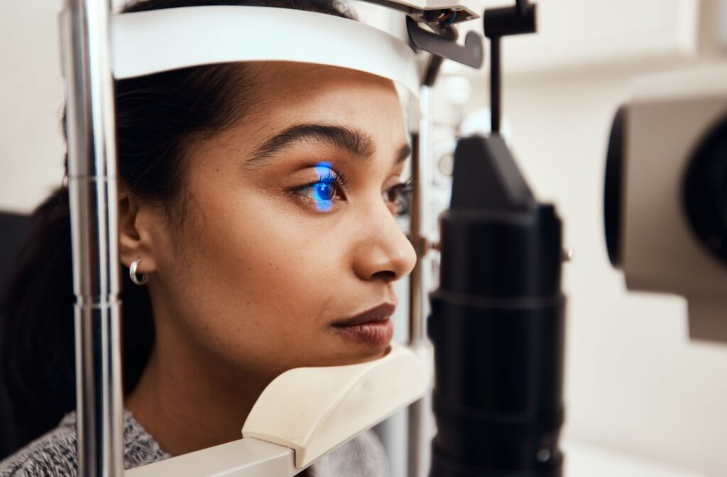 An adult undergoes a slit lamp exam so their eye doctor can look for signs of diabetic retinopathy and other eye conditions.
